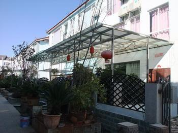 Liye Jingjiang Villa Hotel Лицзян Экстерьер фото